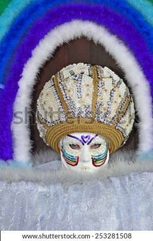 VENICE, ITALY - FEBRUARY 12: Carnival masked costume on a cloud theme during the 2015 Venice Carnival:  February  12, 2015 in Venice, Italy