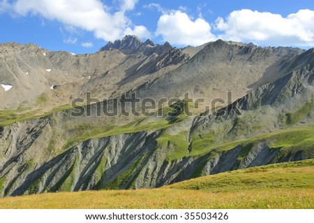 mountainous landscape on the Swiss Italian border where the tour de Mont blanc crosses from Switzerland into Italy