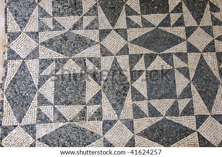 Ancient roman mosaic floor pattern in black and white