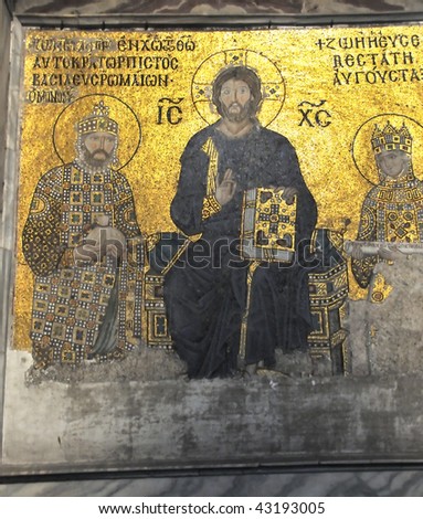 ancient byzantine golden mosaics showing the empress Zoe and the emperor constantine monomachus flanking Jesus Christ and offering gifts to his church in the Aghia Sophia