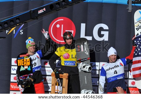 VEYSONNAZ, SWITZERLAND - JANUARY 15:  FIS World Championship Snowboard finals. new world champion Pierre Vaultier, and 2nd David Speiser and Nick Baumgartner.  January 15 in Veysonnaz, Switzerland