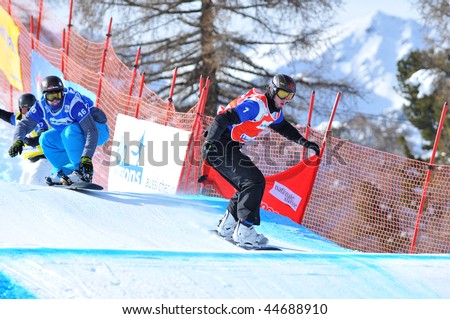 VEYSONNAZ, SWITZERLAND - JANUARY 15:  FIS World Championship Snowboard Cross finals. New world champion Pierre Vaultier leads countryman Tony Ramoin on January 15, 2010 in Veysonnaz, Switzerland