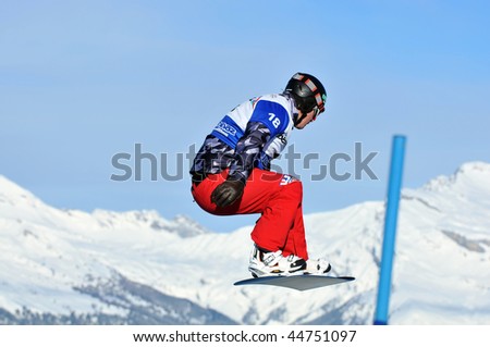 VEYSONNAZ, SWITZERLAND - JANUARY 15: World championship Snowboard cross  finals. Finalist Robert Fagan of Canada. January 15 in Veysonnaz, Switzerland.