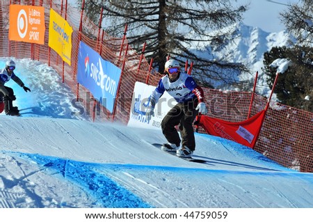VEYSONNAZ, SWITZERLAND - JANUARY 15: World championship Snowboard cross  finals. USA finalist Graham Watanabe. January 15 in Veysonnaz, Switzerland.