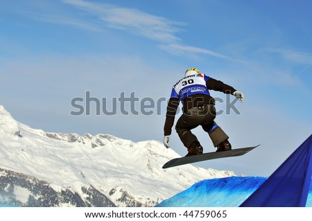 VEYSONNAZ, SWITZERLAND - JANUARY 15: World championship Snowboard cross  finals. Polish finalist Maciej Jodko. January 15 in Veysonnaz, Switzerland.
