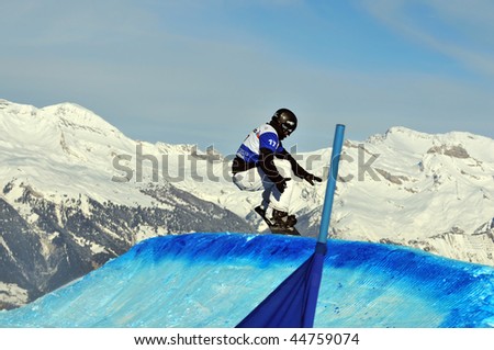 VEYSONNAZ, SWITZERLAND - JANUARY 15: World championship Snowboard cross  finals. Finalist Ludiovic Guillo- Diat of France. January 15 in Veysonnaz, Switzerland.