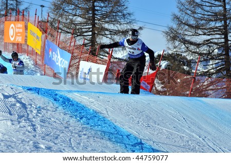 VEYSONNAZ, SWITZERLAND - JANUARY 15: World championship Snowboard cross  finals. Xavier de le rue, french finalist. January 15 in Veysonnaz, Switzerland.