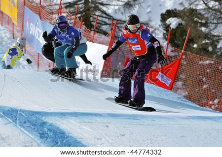 VEYSONNAZ, SWITZERLAND - JANUARY 15: World championship Snowboard cross  finals. Maelle Ricker leads Jacobellis. January 15 in Veysonnaz, Switzerland.