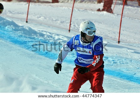 VEYSONNAZ, SWITZERLAND - JANUARY 15: World championship Snowboard cross  finals. Nick Baumgartner team USA. January 15 in Veysonnaz, Switzerland.