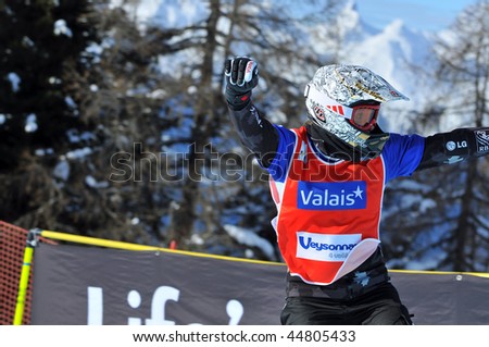 VEYSONNAZ, SWITZERLAND - JANUARY 15: World championship Snowboard cross  finals. Silver medalist Dominique Maltais. January 15 in Veysonnaz, Switzerland.