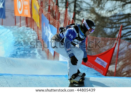 VEYSONNAZ, SWITZERLAND - JANUARY 15: World championship Snowboard cross  finals. Finalist, Fabio Caduff of Switzerland. January 15 in Veysonnaz, Switzerland.
