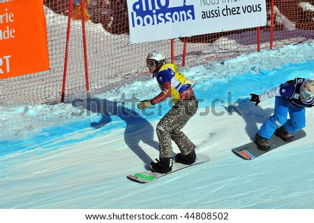 VEYSONNAZ, SWITZERLAND - JANUARY 15: World championship Snowboard cross  finals. Tanja Frieden leading simona Meiler. January 15 in Veysonnaz, Switzerland.