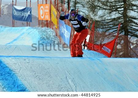 VEYSONNAZ, SWITZERLAND - JANUARY 15: World championship Snowboard cross  finals. Silver medalist David Speiser. January 15 in Veysonnaz, Switzerland.