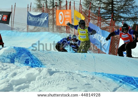 VEYSONNAZ, SWITZERLAND - JANUARY 15: World championship Snowboard cross  finals. Francois Boivin leads Paul Henri de le Rue. January 15 in Veysonnaz, Switzerland.