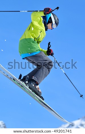 young freerider on skis  jumping