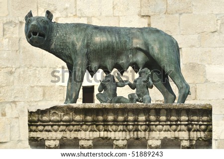 ancient roman bronze of the she-wolf suckling romulus and remus the traditional founders of the city and empire of rome at the UNESCO listed  basilica of Aquileia