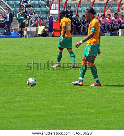 SION, SWITZERLAND - JUNE 4: Drogba takes a free kick for the Ivory Coast in a friendly match against Japan for the 2010 world cup:  June 4, 2010 in Sion Switzerland