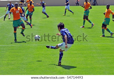 SION, SWITZERLAND - JUNE 4: Nakamuda crosses into the box during Ivory Coast friendly match against Japan for the 2010 world cup:  June 4, 2010 in Sion Switzerland