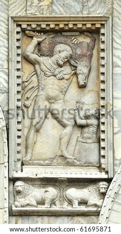 Hercules and the boar. Bas relief in a panel on the main facade of St Mark\'s Basilica, Venice. taken from constantinople.