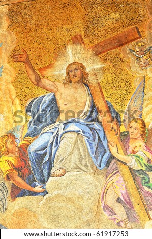 golden mosaic of Christ Jesus enthroned in paradise bearing the cross and attended by angels. Detail from the basilica of St Mark in Venice
