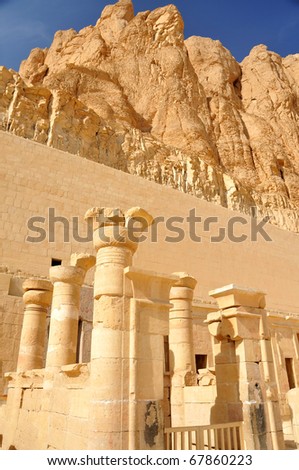 The inner sanctuary of the early new kingdom mortuary temple of Queen Hatshepsut with mountains in the background at Thebes in Egypt