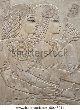 Bas-relief portrait of beautiful young couple with frizzy hair and dreadlocks at the Tomb of Ramose in the ancient egyptian necropolis of the nobles at thebes near Luxor, Egypt
