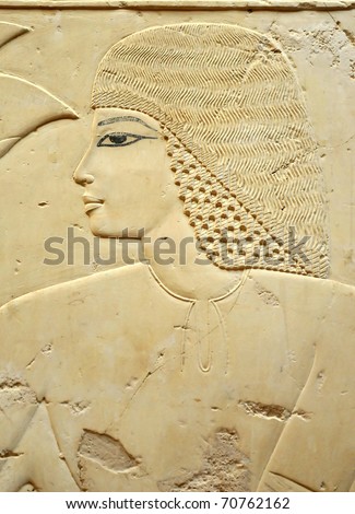 Bas-relief portrait of a handsome man with frizzy hair from the Tomb of Ramose in the ancient egyptian necropolis of the nobles at thebes near Luxor, Egypt