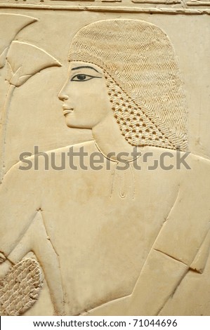 ancient Egyptian relief portrait of a handsome and serene young man