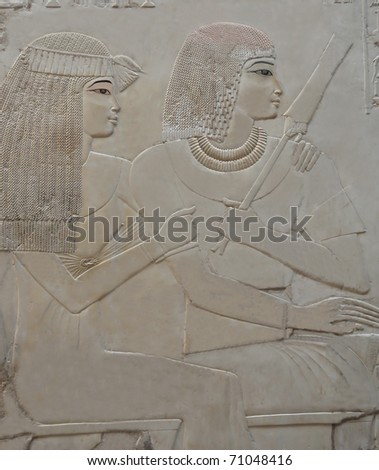 Portrait of young loving couple with frizzy hair from the Tomb of Ramose in the ancient egyptian necropolis of the nobles at thebes near Luxor, Egypt