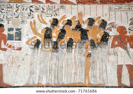 Women mourning the passing of the head of the household, the widow at the front supported by an attendant. From the tomb of Ramose in the ancient egyptian necropolis of the nobles near Luxor, Egypt