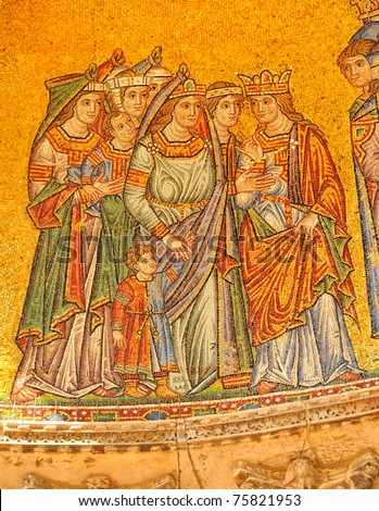 Ancient and beautiful golden mosaic of a group of a queen with retinue of expensively dressed ladies in waiting. from the basilica of Saint Mark, Venice