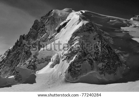 the Mt Blanc de Tacul in the Mont Blanc massif, French Alps. In black and white
