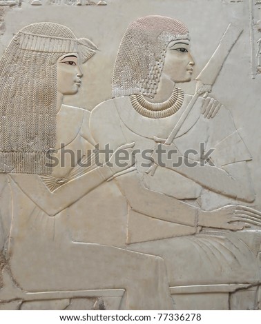 Exquisite portrait of young loving couple with frizzy hair from the Tomb of Ramose in the ancient egyptian necropolis of the nobles at thebes near Luxor, Egypt