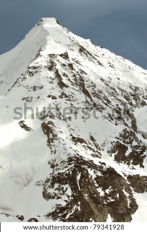 the north face of the swiss summit Obergabelhorn, above Zermatt. Showing the Arbengrat and the Coeurgrat ridges