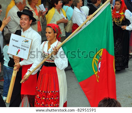 EVOLENE, SWITZERLAND - AUGUST 15: portuguese dance group at the International Festival of Folklore and Dance from the mountains (CIME) : August 15, 2011 in Evolene Switzerland
