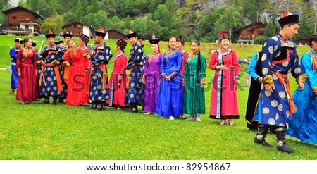 EVOLENE, SWITZERLAND - AUGUST 15: Buryat dance troupe at the International Festival of Folklore and Dance from the mountains (CIME) : August 15, 2011 in Evolene Switzerland