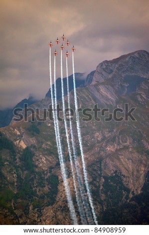 SION, SWITZERLAND - SEPTEMBER 17: Patrouille de France in a steep climb  at the Breitling Air show.  September 17, 2011 in Sion, Switzerland