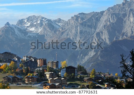 the famous skiing resort of Nendaz in the Swiss Alps against a backdrop of the Bernese Alps in the fall