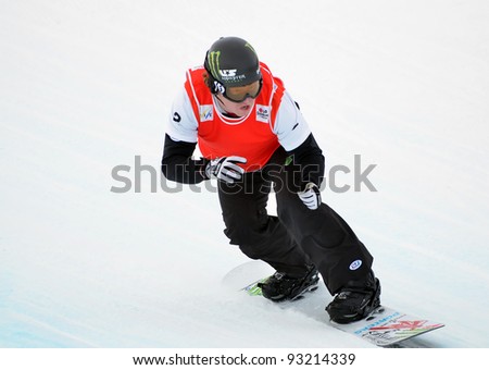 VEYSONNAZ, SWITZERLAND - JANUARY 19: Silver medallist Nate Holland (USA)  in the FIS World Championship Snowboard Cross finals : January 19, 2012 in Veysonnaz Switzerland