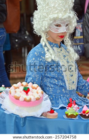 VENICE, ITALY - FEBRUARY 12: Cake table Carnival costume at the 2015 Venice Carnival:  February  12, 2015 in Venice, Italy