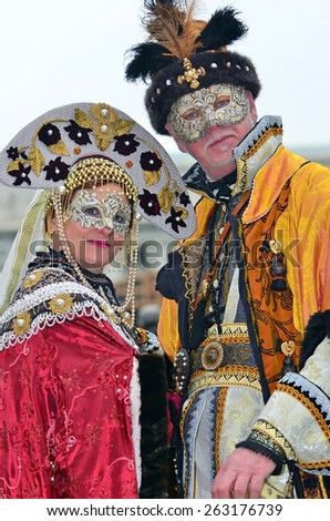 VENICE, ITALY - FEBRUARY 12: Senior couple in fantasy costume at the 2015 Venice Carnival:  February  12, 2015 in Venice, Italy