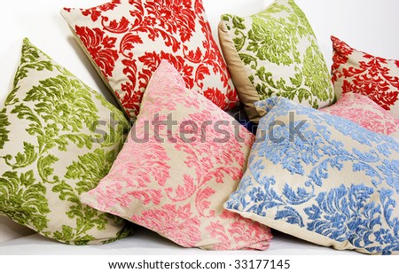Combination of different colored and patterned pillows