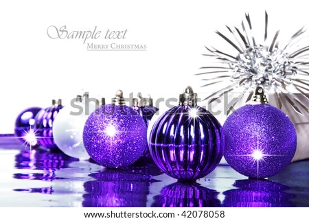 stock-photo-silver-and-purple-christmas-decorations-with-space-for-text-42078058.jpg