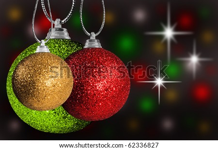 Colorful red, green and gold christmas decorations on strings