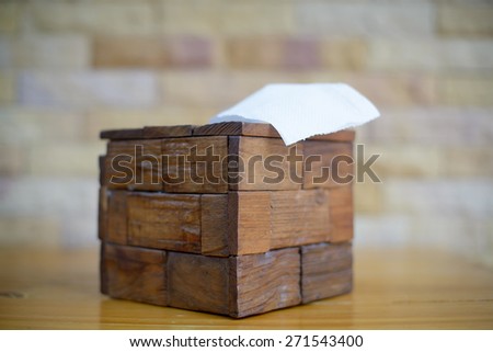 Wood for the tissue box, handmade in Thailand.