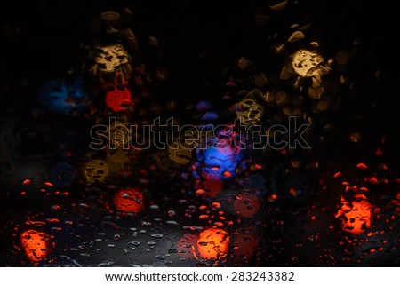 Rainy Night,Rain drops on window,rain background,rain and bokeh