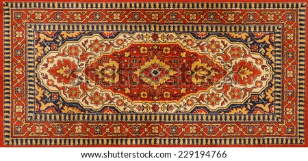 Old Persian red carpet with pattern