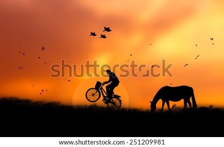 Silhouette human in lifestyle happy up over blurred on sunset nature background.