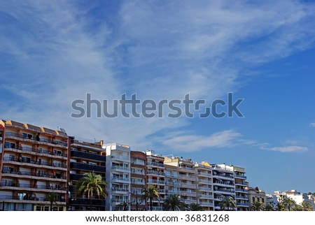 Cityscape of Lloret de Mar, Spain. Hotel and residence buildings by the sea.