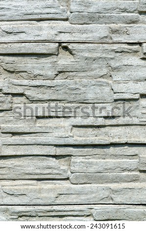The texture of the decorative concrete fence, vertical background